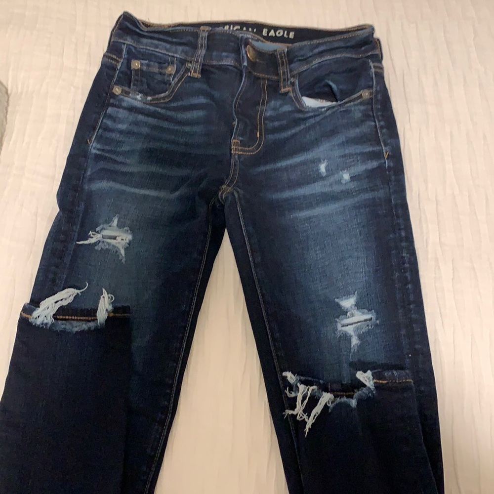 Ripped American Eagle jeans.